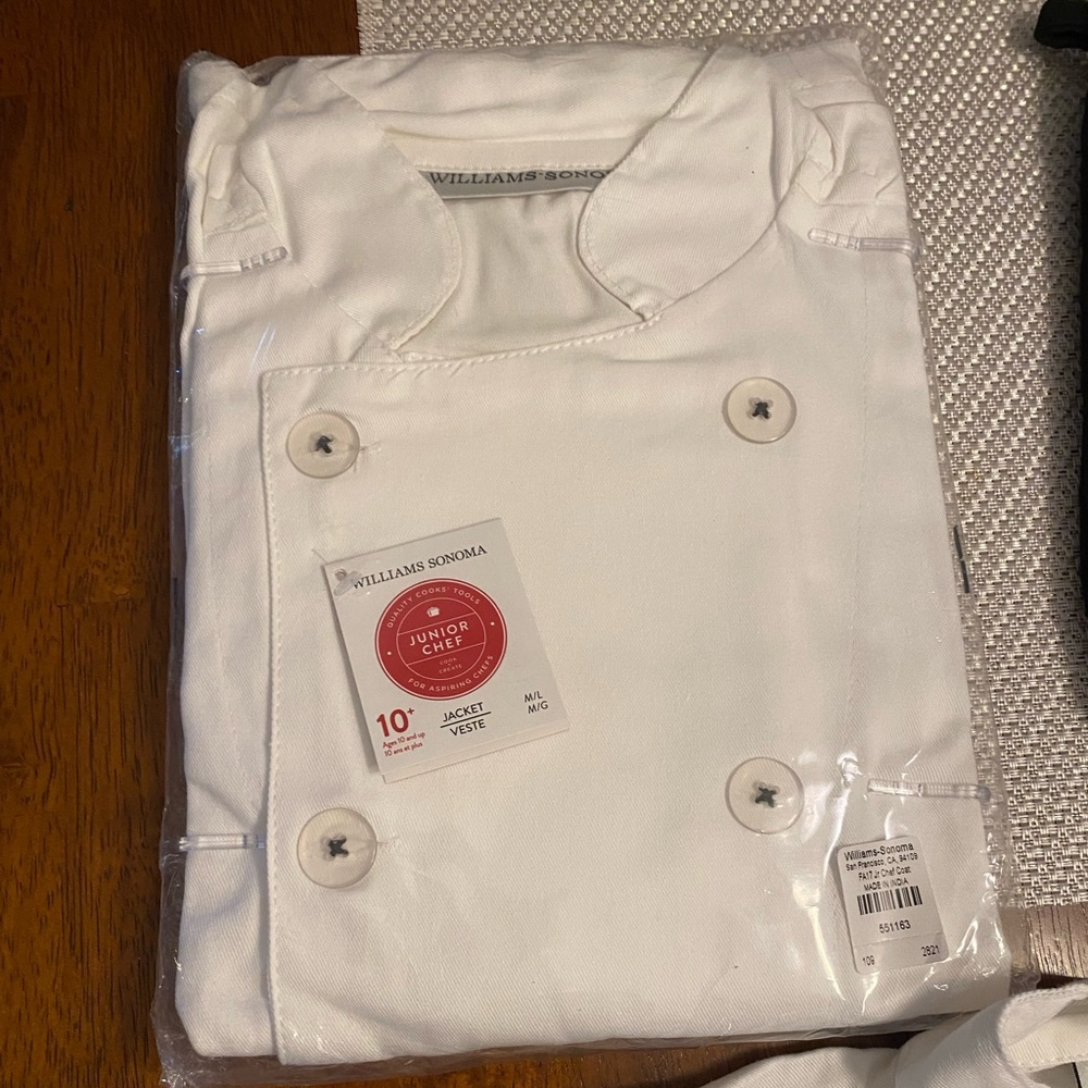 Two William Sonoma chef jackets.  Kids size jackets with oven mits.